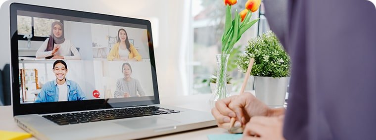 muslim-businesswoman-using-laptop-talk-colleague-about-plan-by-video-call-brainstorm-online-meeting-while-remotely-work-from-home-living-room-min